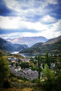 High angle view of town by river