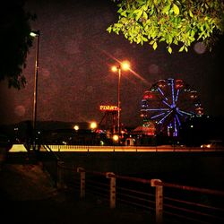 Illuminated street light at night