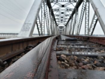 Surface level of railroad tracks against bridge