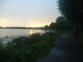 Scenic view of calm lake against sky