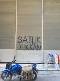 Bicycle parked against brick wall in store