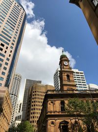 Low angle view of skyscrapers against sky