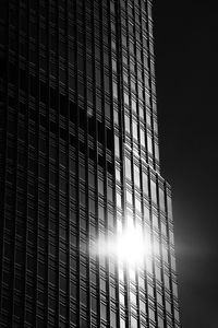 Low angle view of modern building against sky in city
