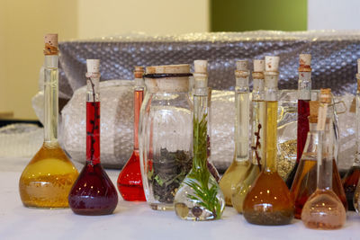 Close-up of glass bottles on table