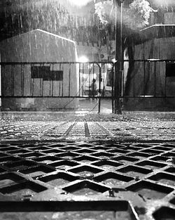 Surface level of street amidst buildings in city