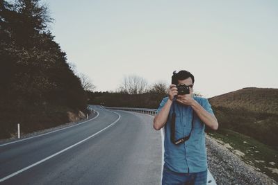 Man walking on road