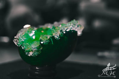 Close-up of water drop on table