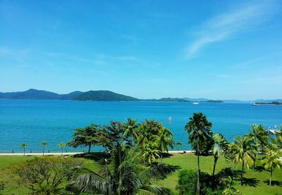 Scenic view of sea against clear blue sky