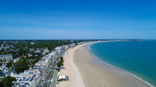 High angle view of beach against blue sky