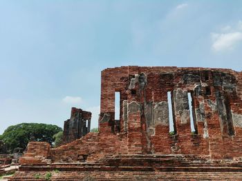 Low angle view of old ruin against sky