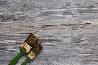 High angle view of paintbrushes on table