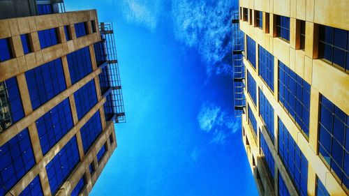 Low angle view of modern building against sky