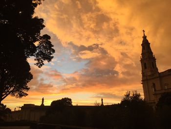 Silhouette of tower at sunset