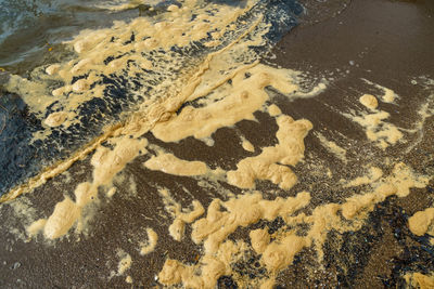 High angle view of sand on beach