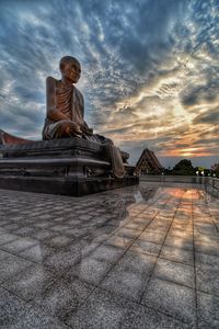 Statue against sky during sunset