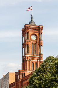 Clock tower against sky in city