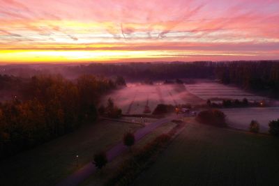 Aerial view of landscape during sunset