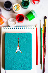 High angle view of paintbrushes on table