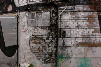 Damaged window on old building