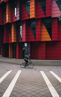 Man riding bicycle in city