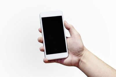 Low section of person using mobile phone