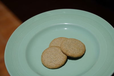 High angle view of cookies in plate