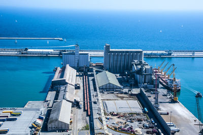 High angle view of ship by sea against sky