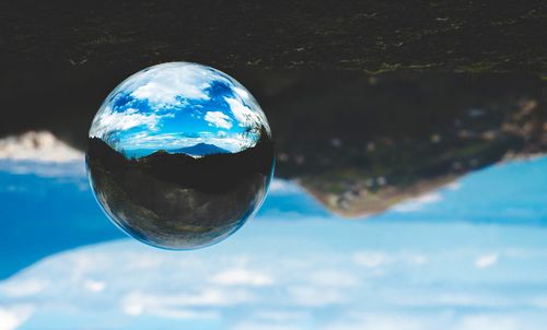 Reflection of blue sky in water