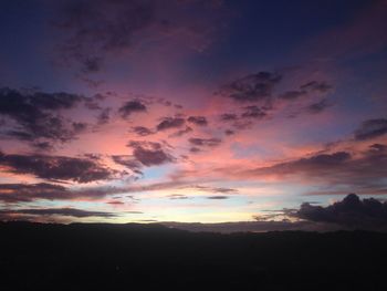 Scenic view of silhouette landscape against sky during sunset