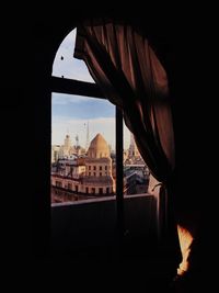 Buildings seen through window