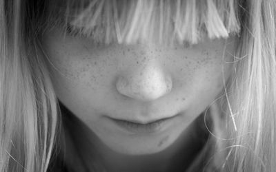 Close-up of a girl looking down