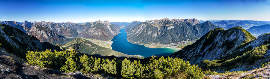 Panoramic view of landscape with mountain range in background