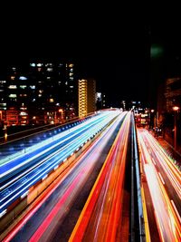 Light trails on city street at night