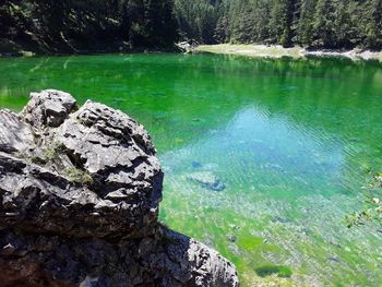 Scenic view of rocks in lake