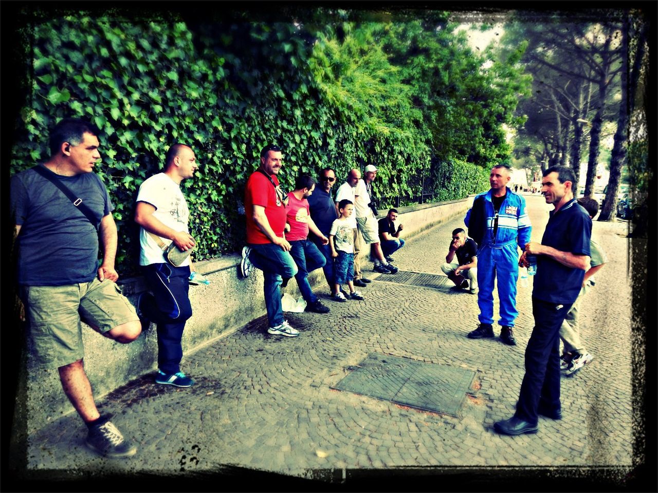 lifestyles, transfer print, togetherness, leisure activity, men, full length, person, large group of people, casual clothing, walking, auto post production filter, tree, rear view, love, friendship, boys, girls, street, bonding