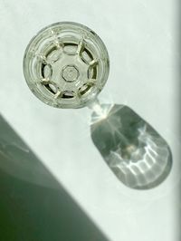 High angle view of glass of water on table