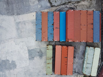 High angle view of multi colored containers 