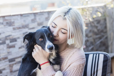 Close-up of woman with dog