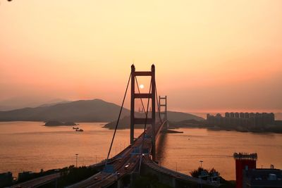 View of suspension bridge at sunset