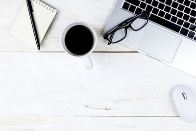 High angle view of coffee cup on table