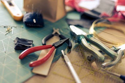 High angle view of work tools on table