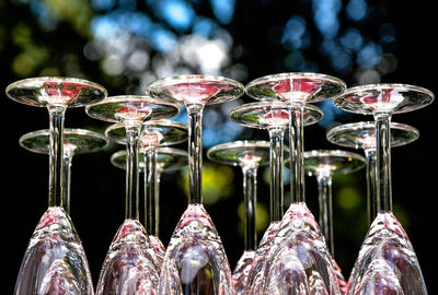 Close-up of glasses on glass table