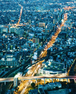 High angle view of illuminated cityscape