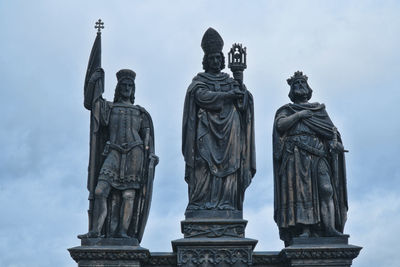 Low angle view of statue against sky