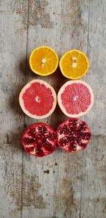 Orange fruits against in the table