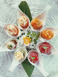 High angle view of fruits in plate on table