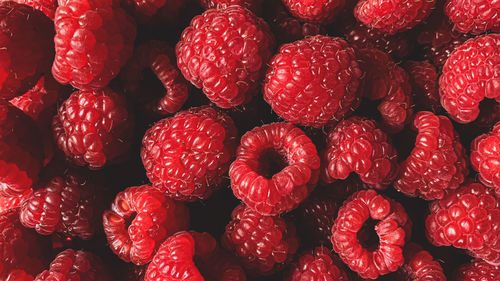 Raspberry background. full frame textured berry background. healthy lifestyle and eating concept