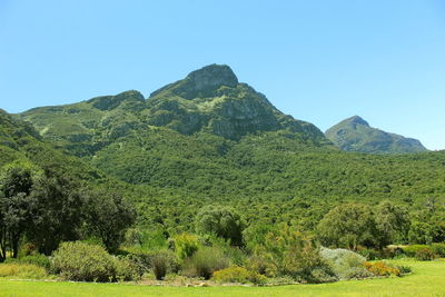 Scenic view of mountains against clear sky
