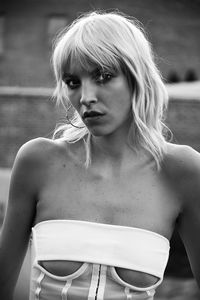 Portrait of a blonde beauty on rooftop