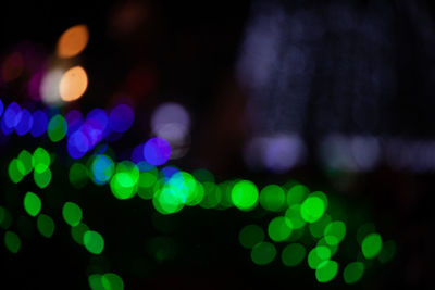 Defocused image of illuminated lights at night